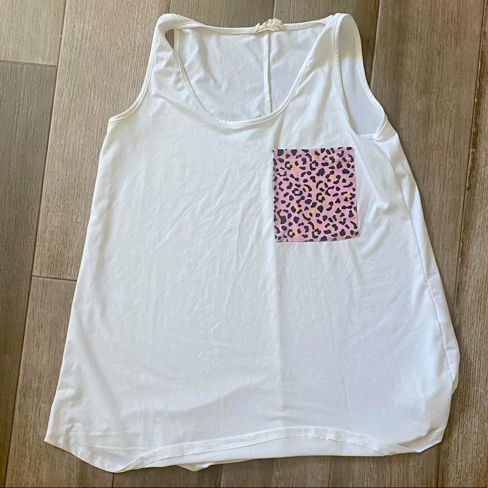 Tank with pocket detail
